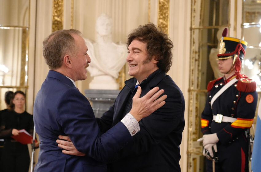  Con Lamelas antes
de viajar a EE.UU.